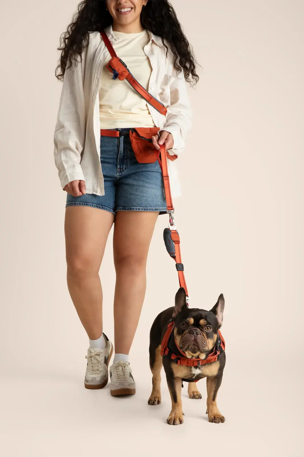 Owner wearing the full Gentle Wuff kit with their dog