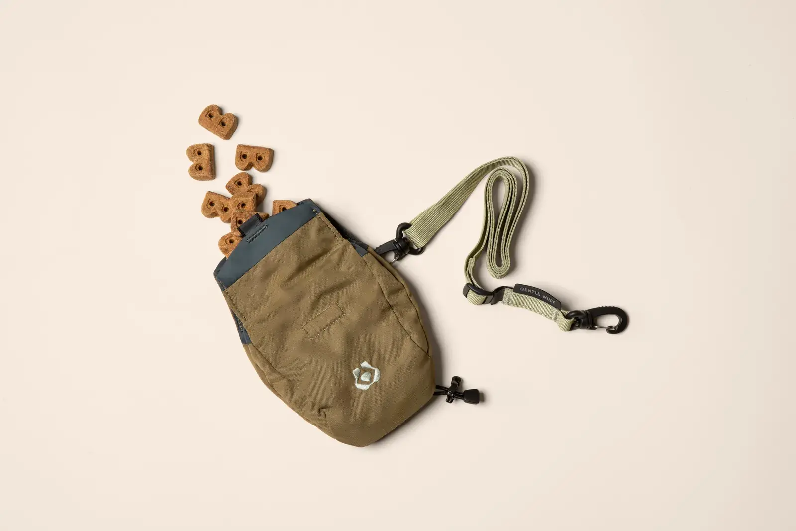 Snack Sack lying open with treats spilling out